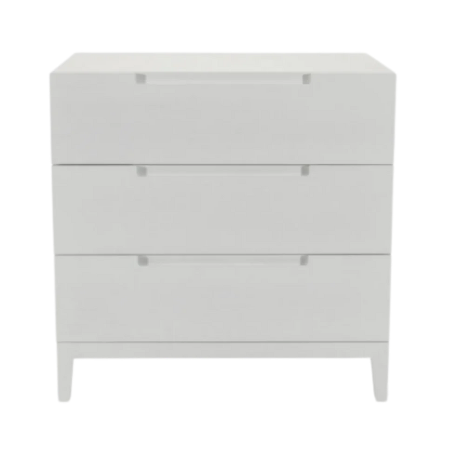 White dresser with three drawers on a white background