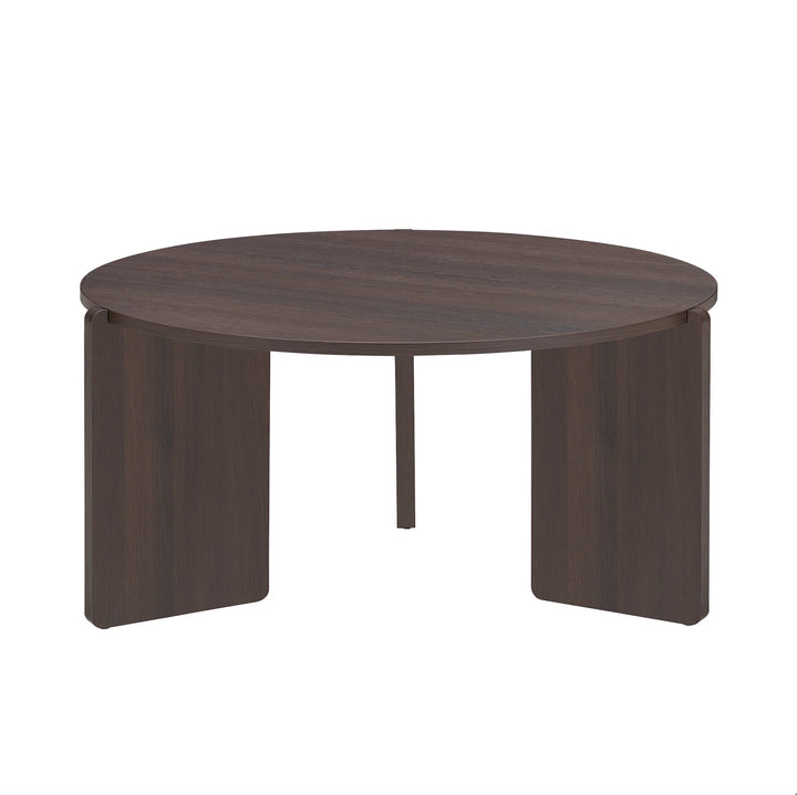 Round wooden table on a white background