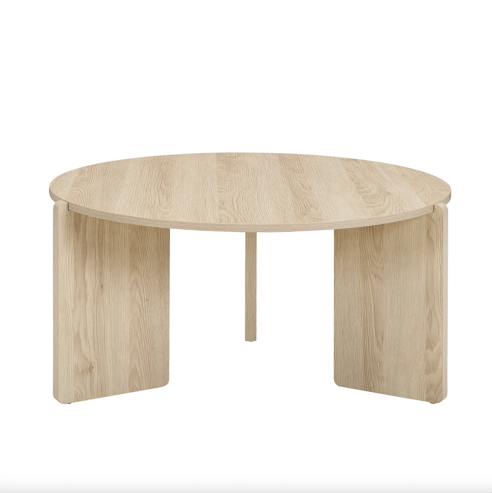 Round wooden table on a white background