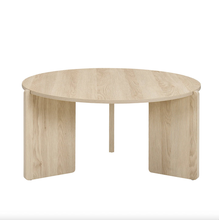 Round wooden table on a white background