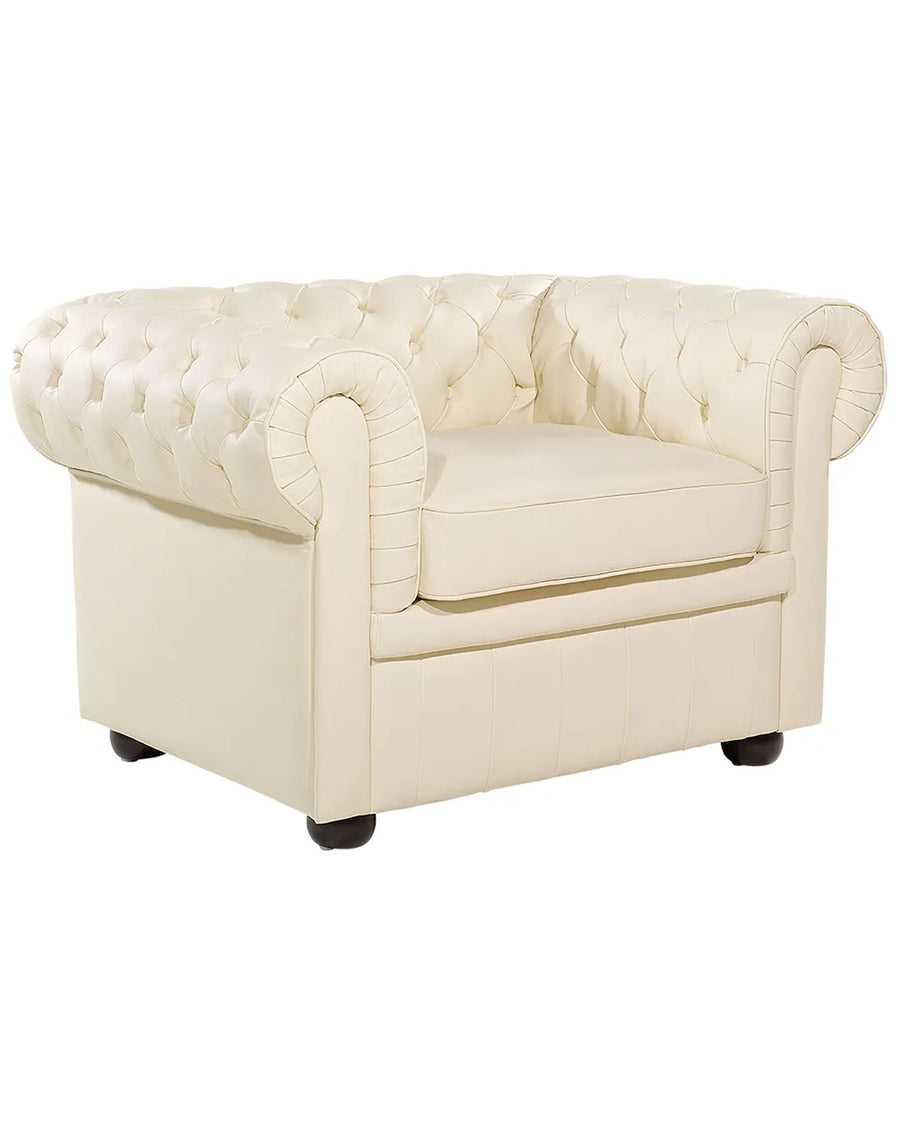 Cream-colored armchair with tufted backrest on a white background