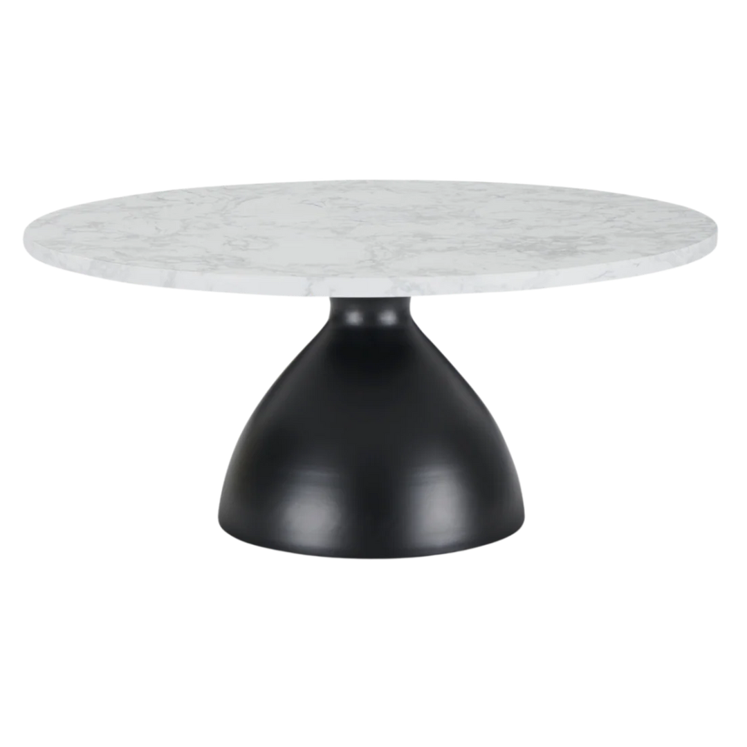 Round marble table with a black base on a white background