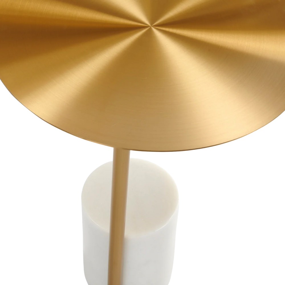 Close-up of a gold metallic object on a white background