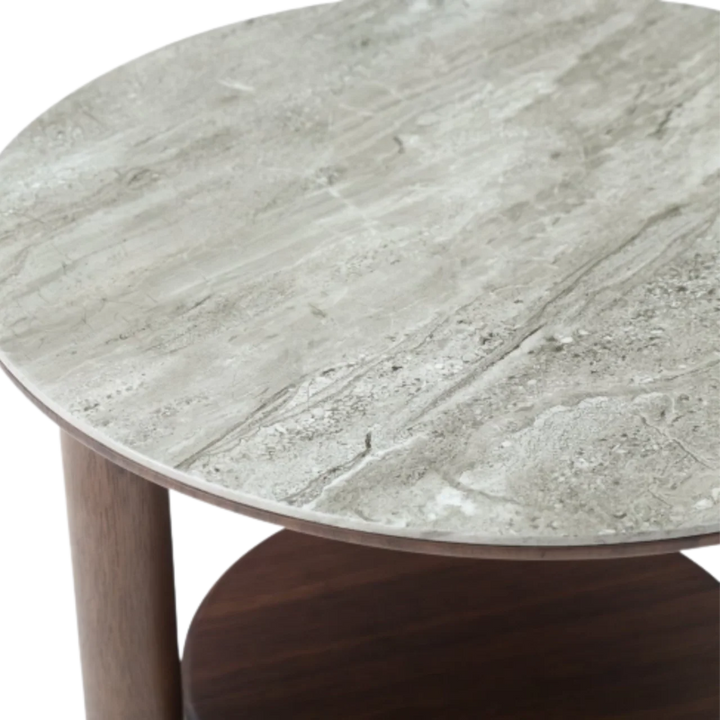 Round table with a stone-like top and wooden base on a white background