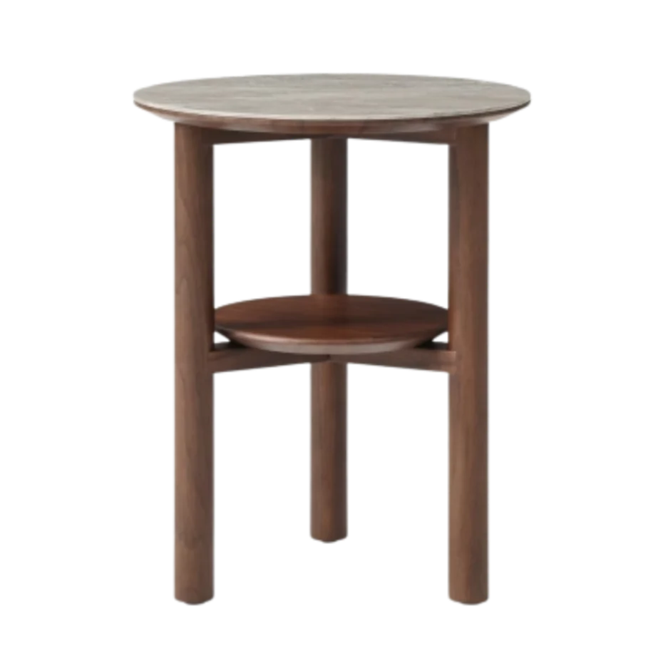 Wooden side table with a round top and shelf on a white background