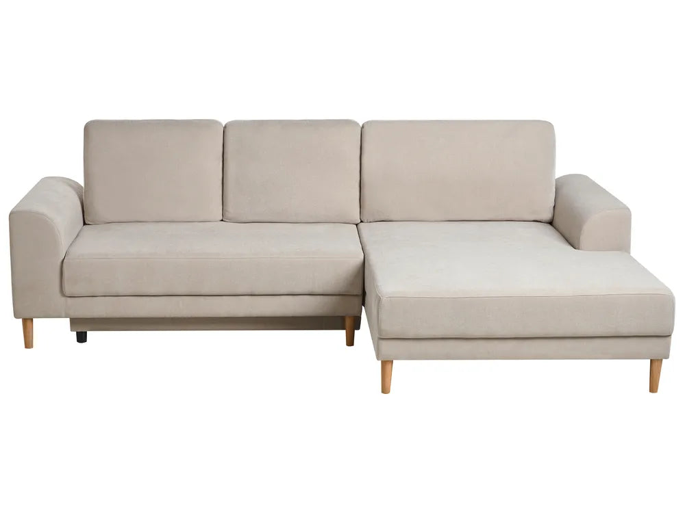 Beige sectional sofa on a white background