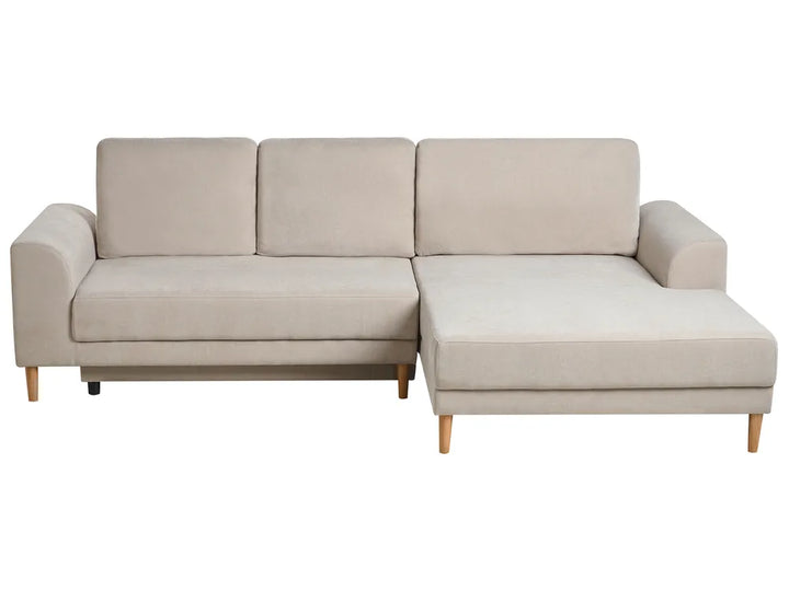 Beige sectional sofa on a white background