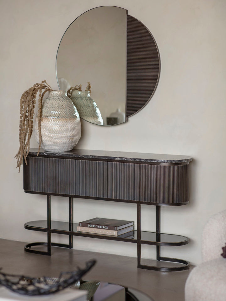 Aged black oval console table with marble top and gilded bronze frame
