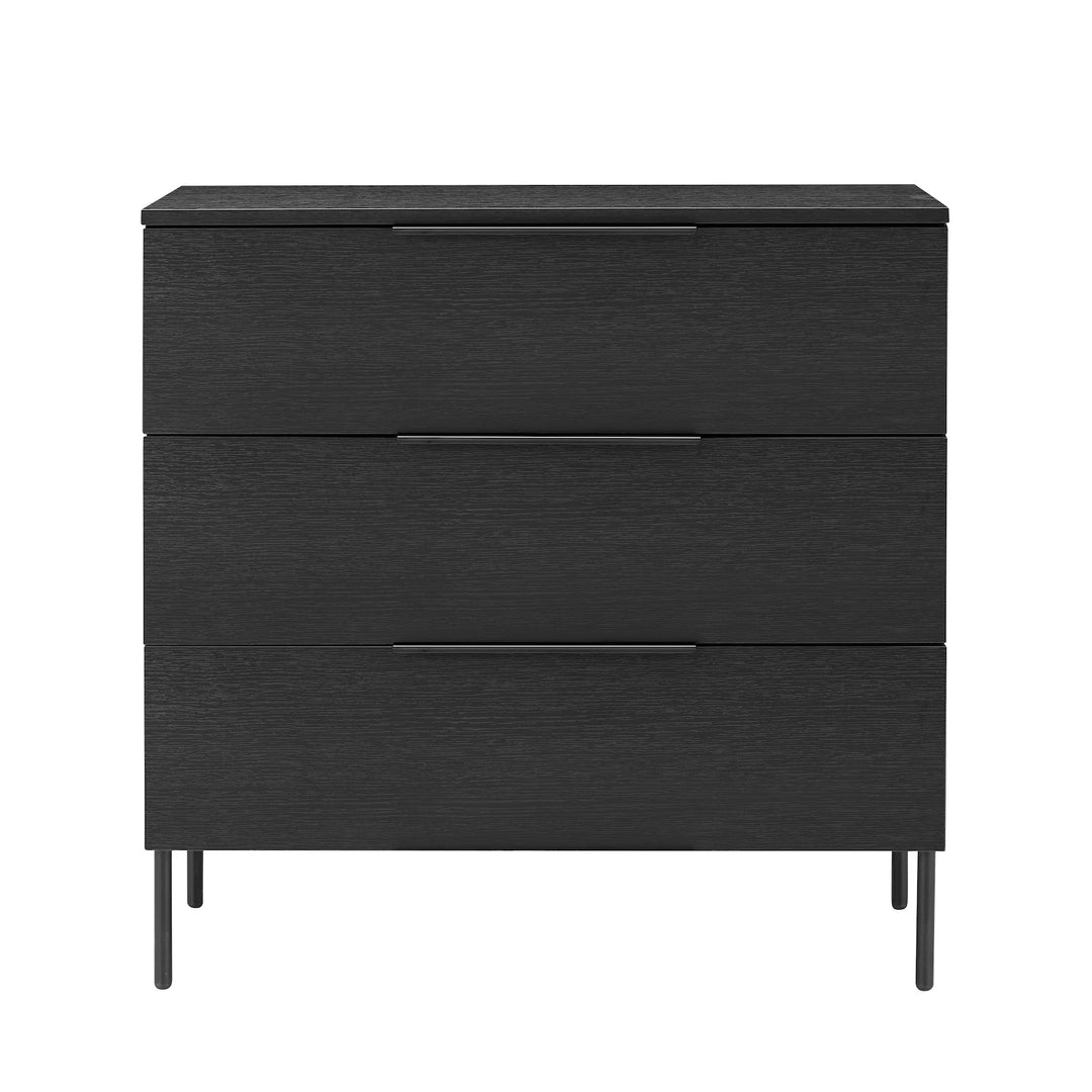 Black three-drawer dresser on a white background