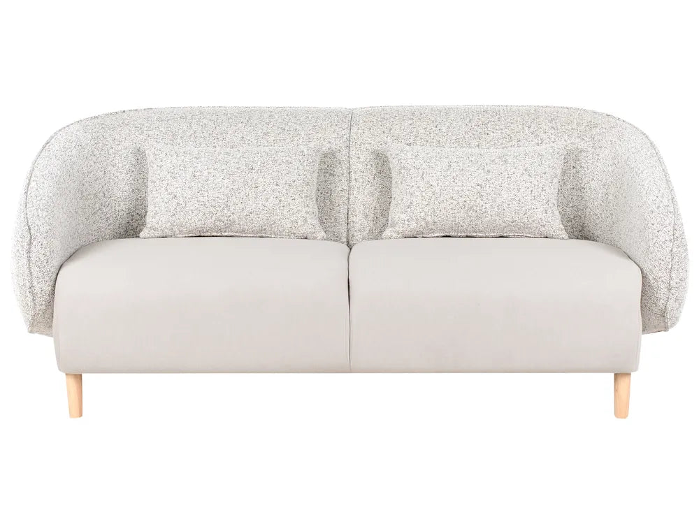 Gray sofa with textured backrest on a white background