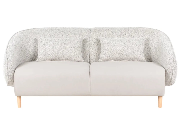Gray sofa with textured backrest on a white background