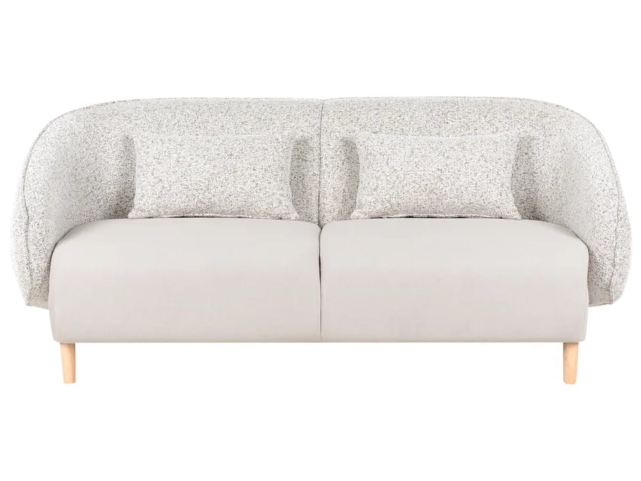 Gray sofa with textured backrest on a white background