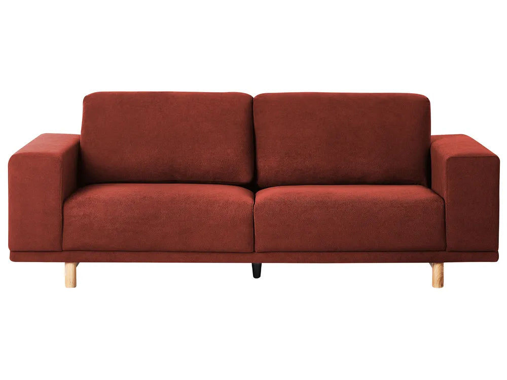 Red sofa with wooden legs on a white background