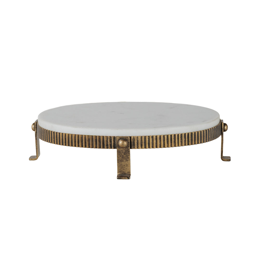 Close-up of White Banswara marble and antique gold base on Belvedere oval one-tier stand