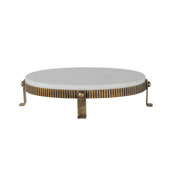 Close-up of White Banswara marble and antique gold base on Belvedere oval one-tier stand