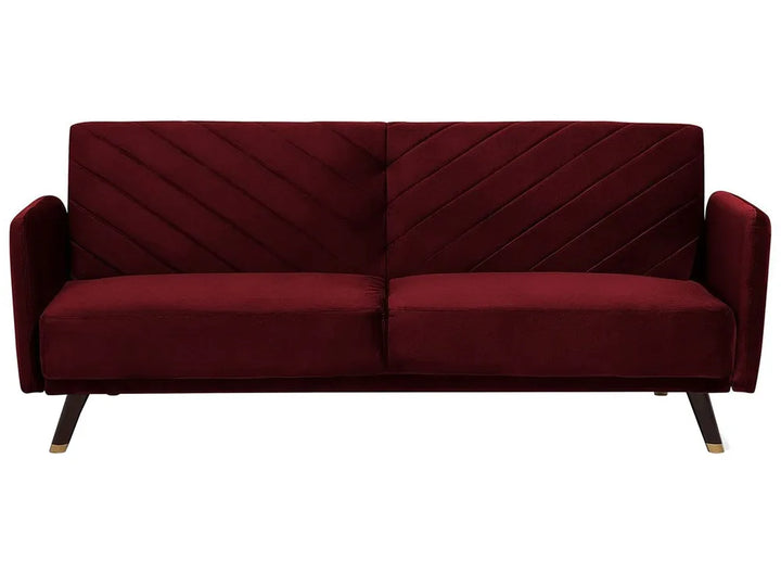 Maroon sofa with a diamond pattern on a white background