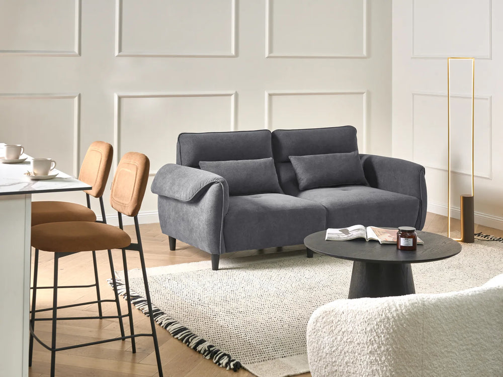 Dark grey sofa with supportive cushions and backrest