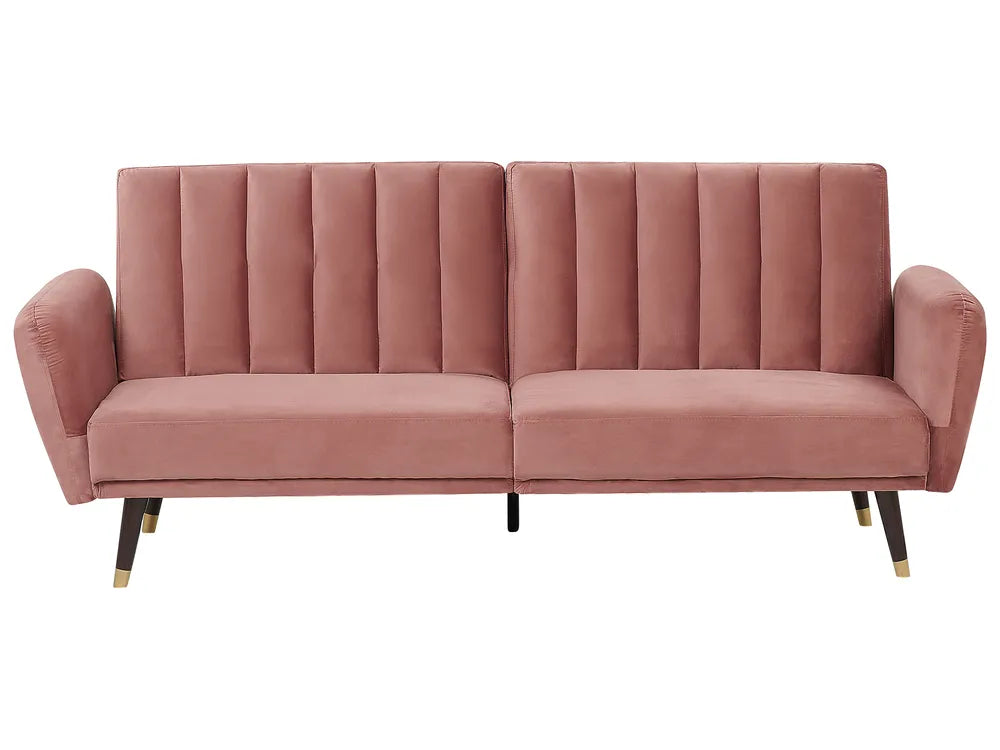  The plush velvet upholstery offers a soft, inviting feel.