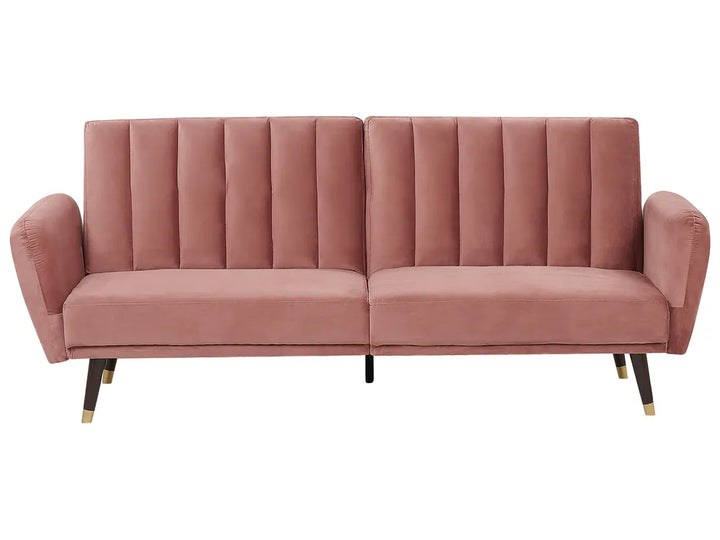  The plush velvet upholstery offers a soft, inviting feel.