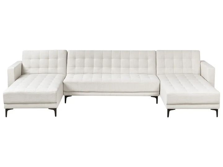 White sectional sofa on a white background
