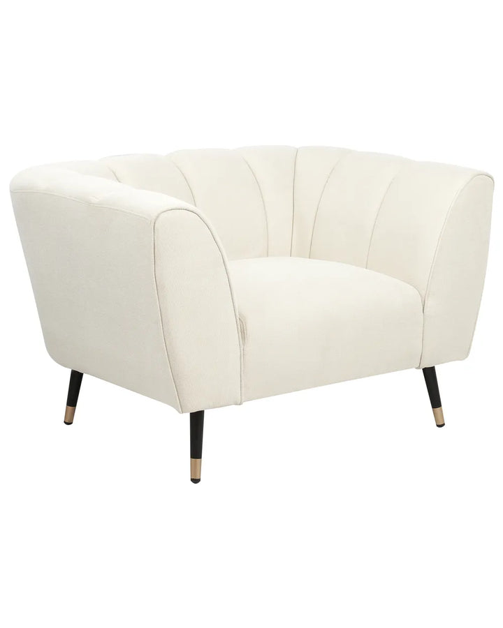 White armchair with black legs on a white background