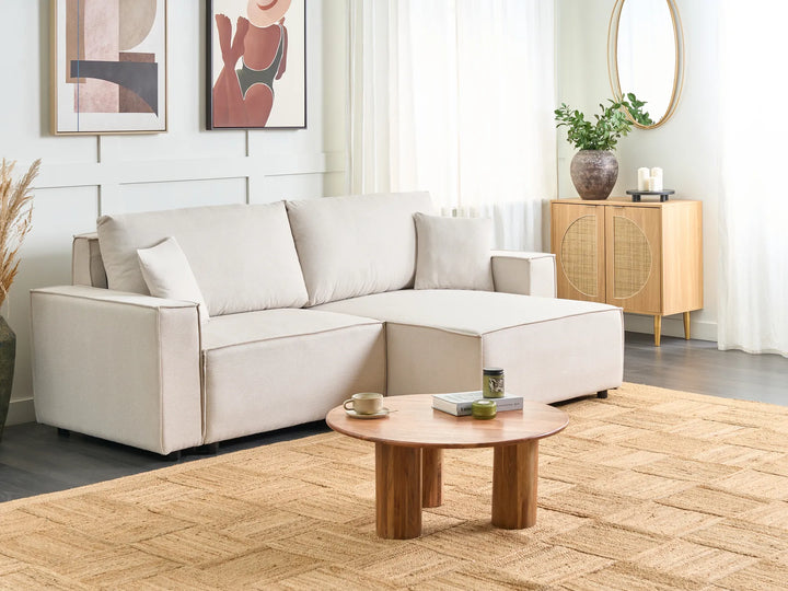 3-seater beige corner sofa bed with hidden storage and soft upholstery, contemporary design