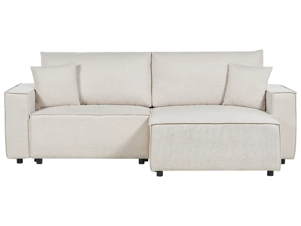 Beige fabric left-hand corner sofa bed with storage and cushions in a modern living room