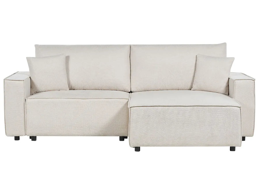 Beige fabric left-hand corner sofa bed with storage and cushions in a modern living room