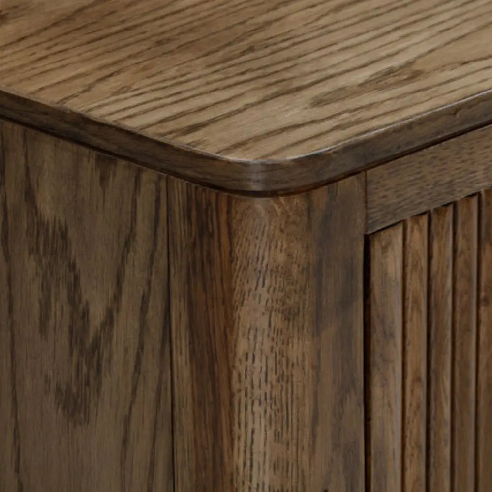 Close-up of a wooden cabinet with a rustic finish