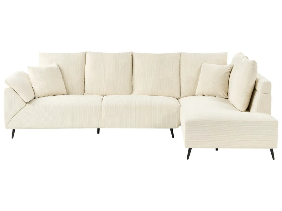 Beige sectional sofa on a white background