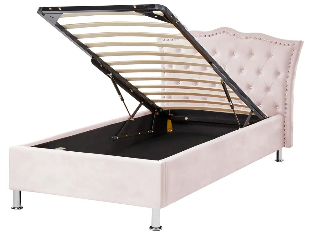 Pink upholstered bed frame with metal slat support on a white background