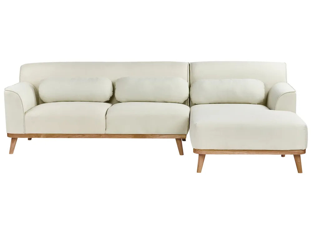 Beige sectional sofa on a white background