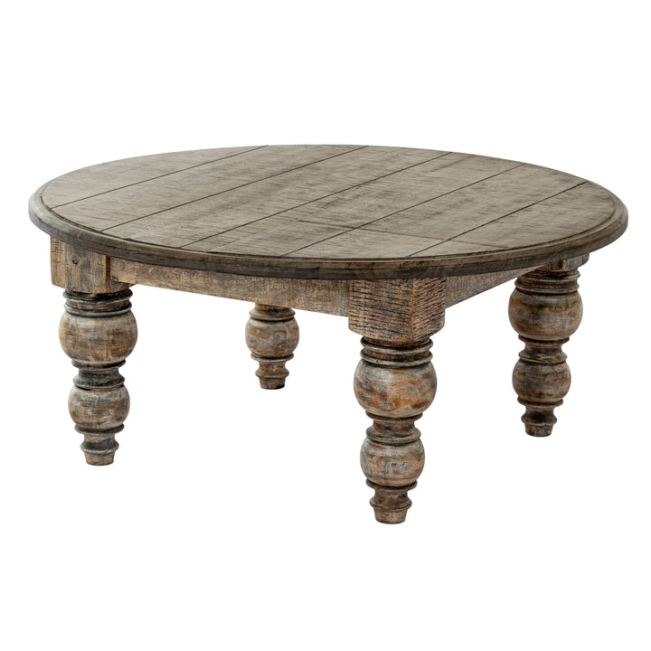 Round wooden table with rustic legs on a white background