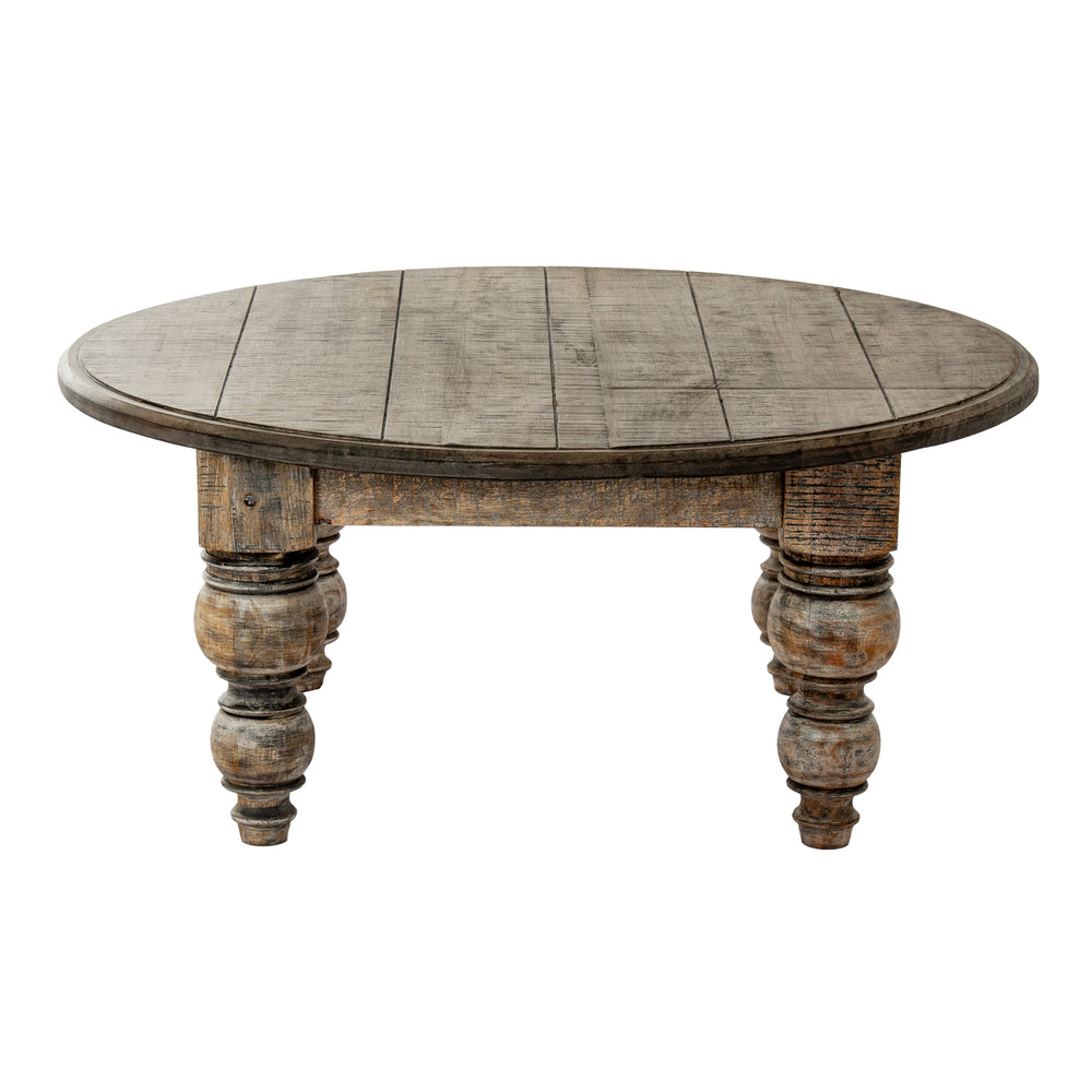 Round wooden table with rustic legs on a white background