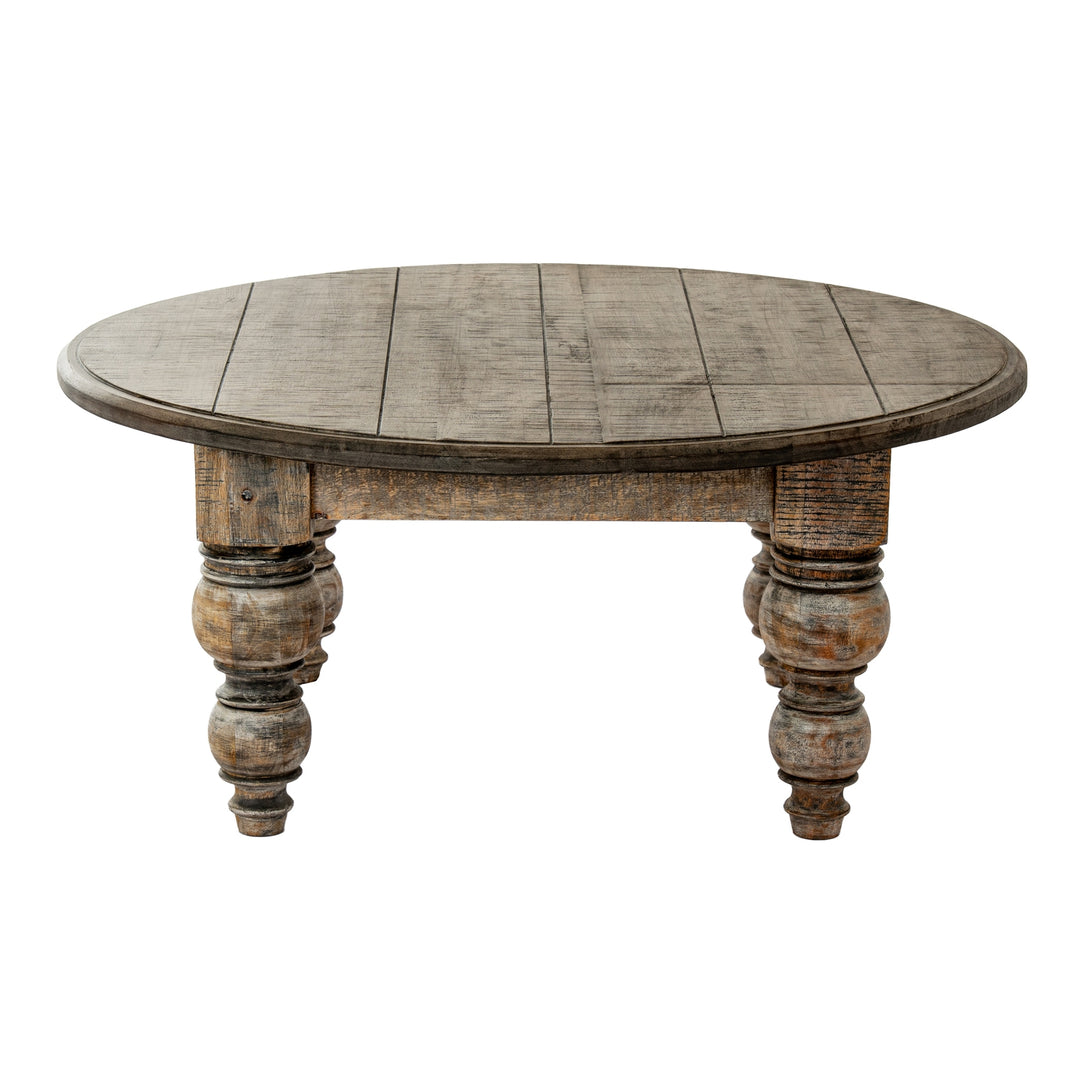 Round wooden table with rustic legs on a white background