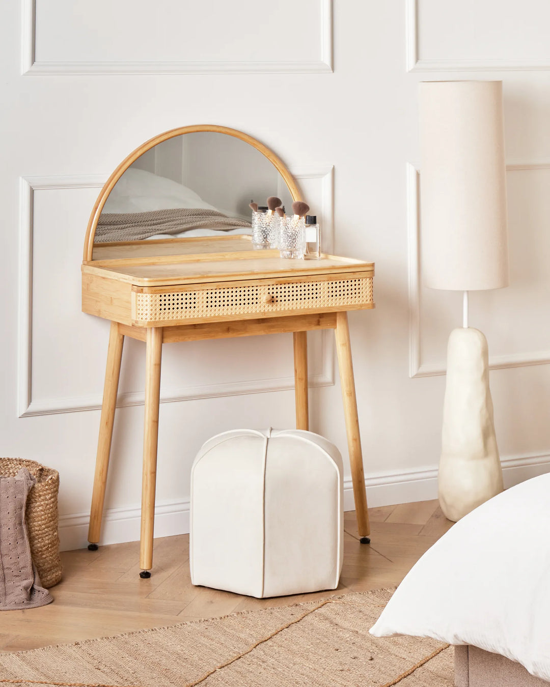Wooden vanity table with mirror in a bedroom setting