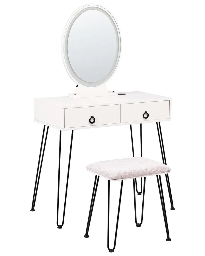 White vanity table with two drawers, black hairpin legs, an oval mirror, and a matching white cushioned stool on a white background.