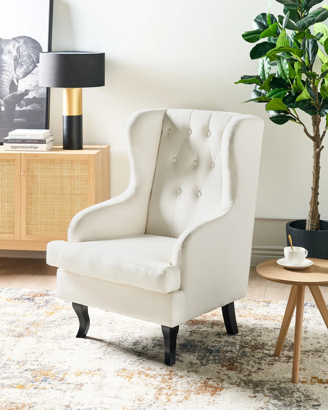 The Calyn Wingback Chair combines timeless silhouette with contemporary comfort.