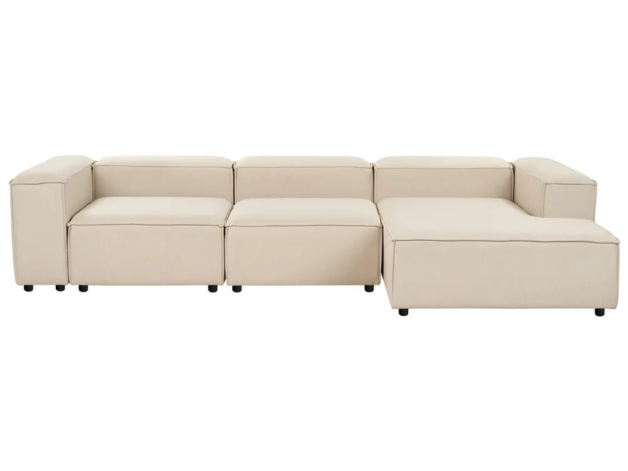 Beige sectional sofa on a white background