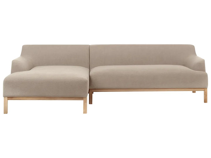 Beige sectional sofa on a white background