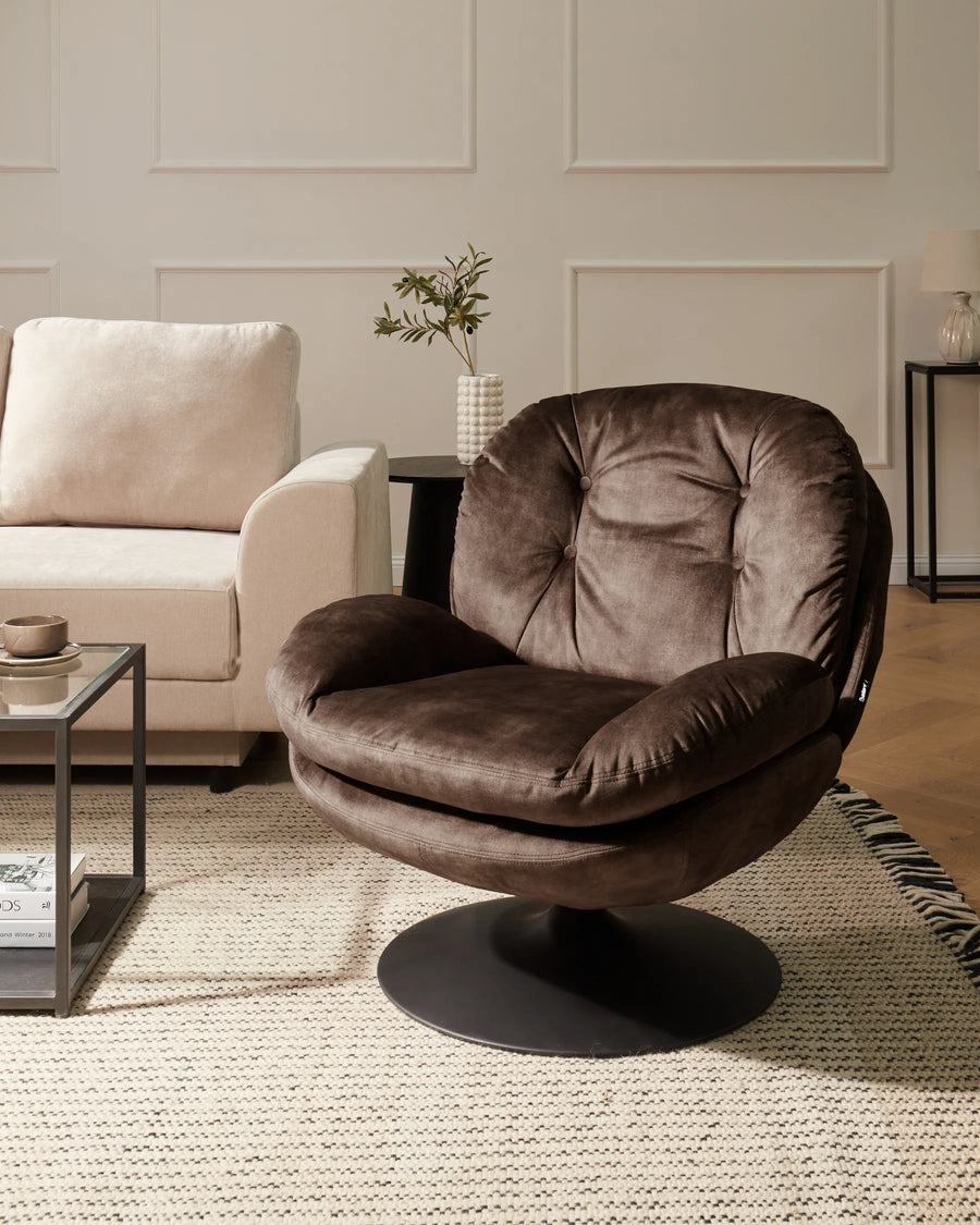 Upholstered in sumptuous dark brown velvet.