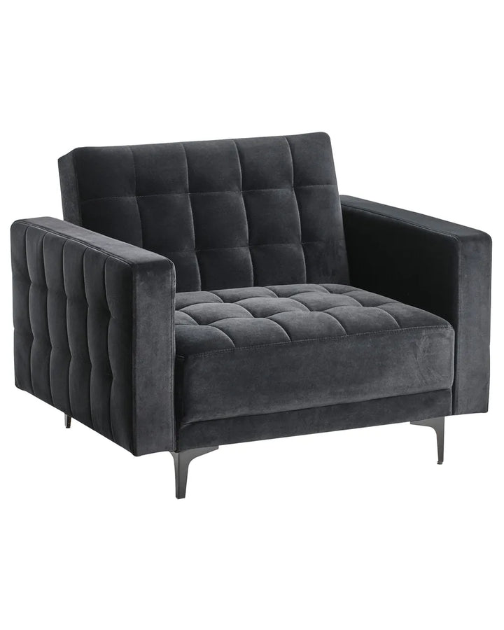 Gray tufted armchair on a white background