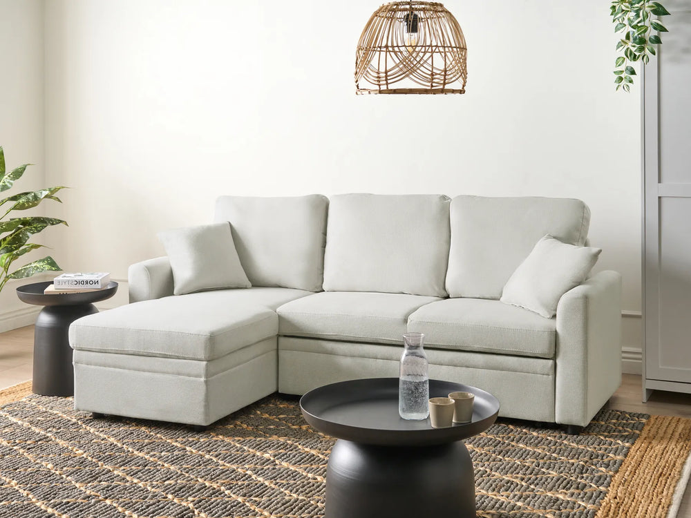 Right hand light beige fabric corner sofa bed with storage