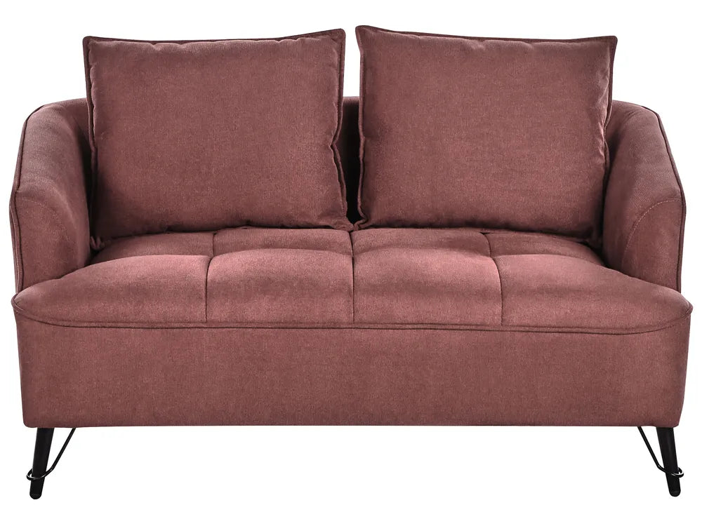 Pink sofa with two cushions on a white background