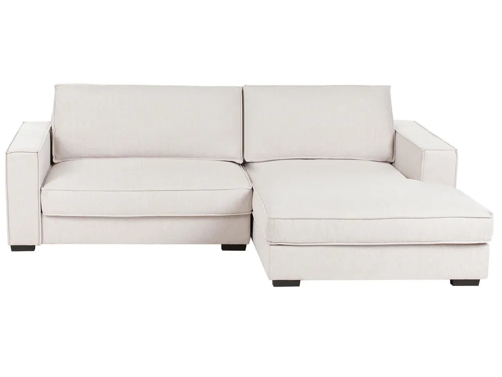 White sectional sofa on a white background