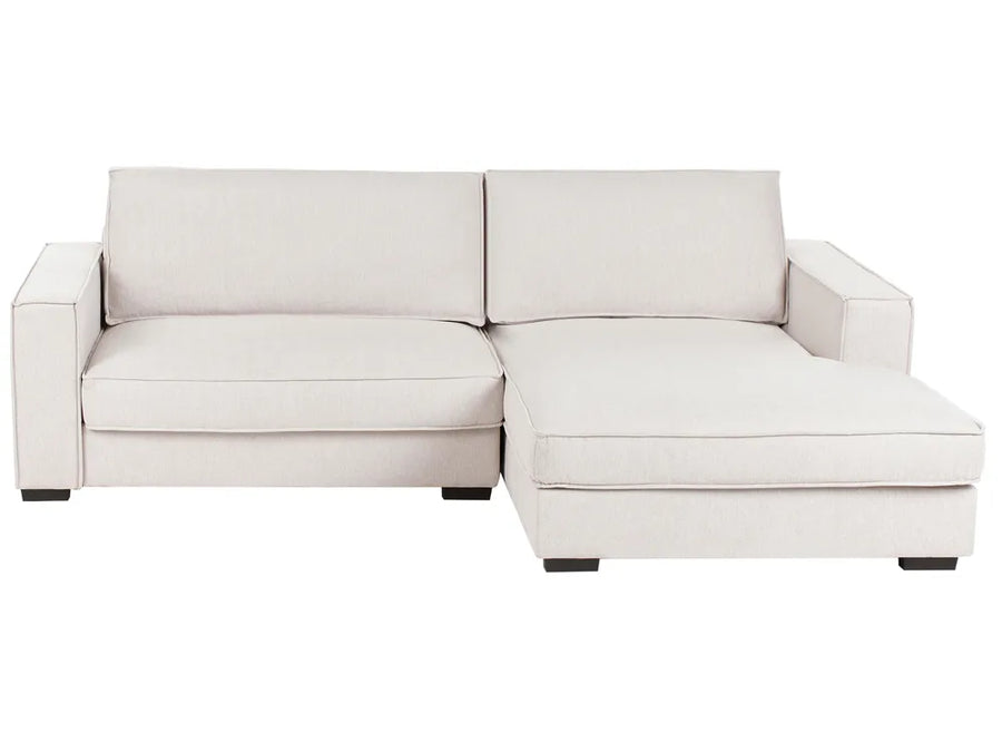 White sectional sofa on a white background