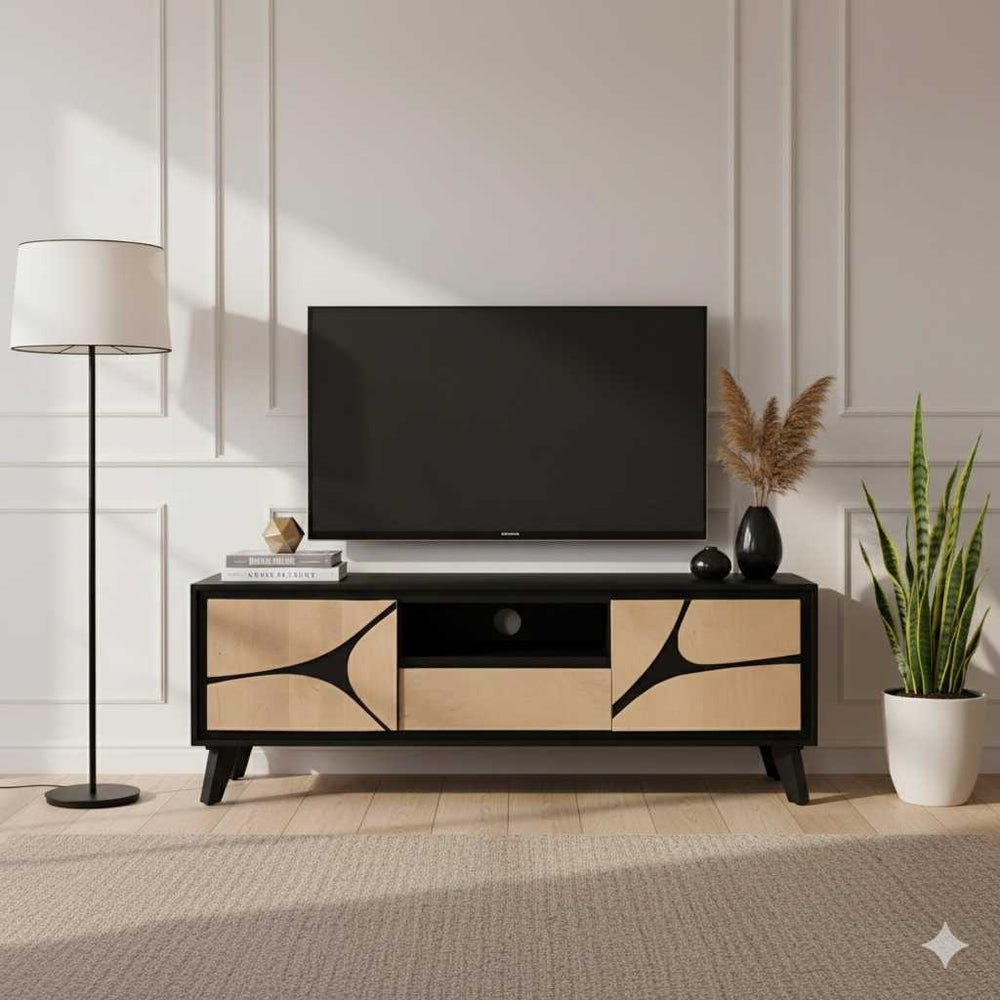 Modern TV stand with a television in a stylish living room setting.