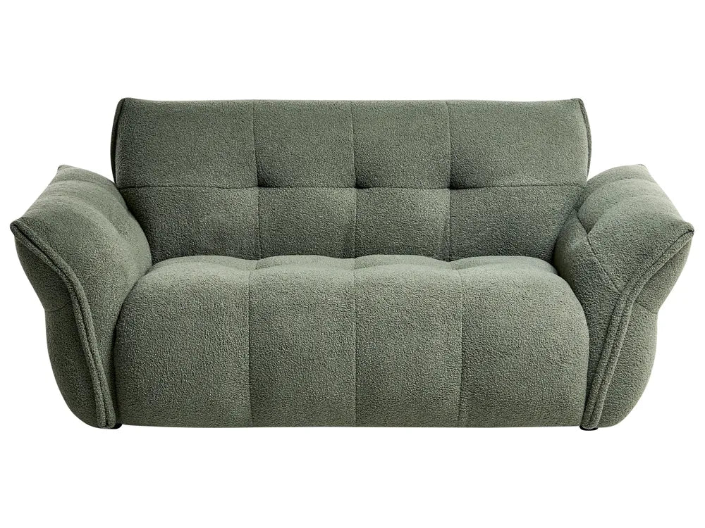 Green sofa on a white background