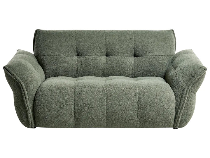 Green sofa on a white background