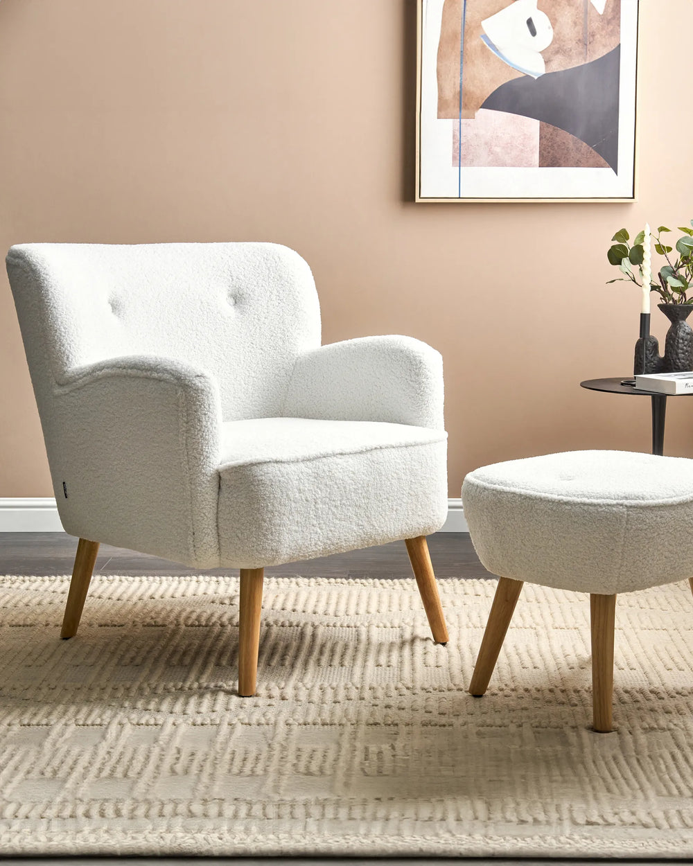 Crafted from luxurious boucle fabric in crisp white.